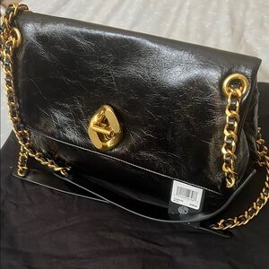 Elegant Black Leather Chain Bag Rebecca Minkoff gently used.